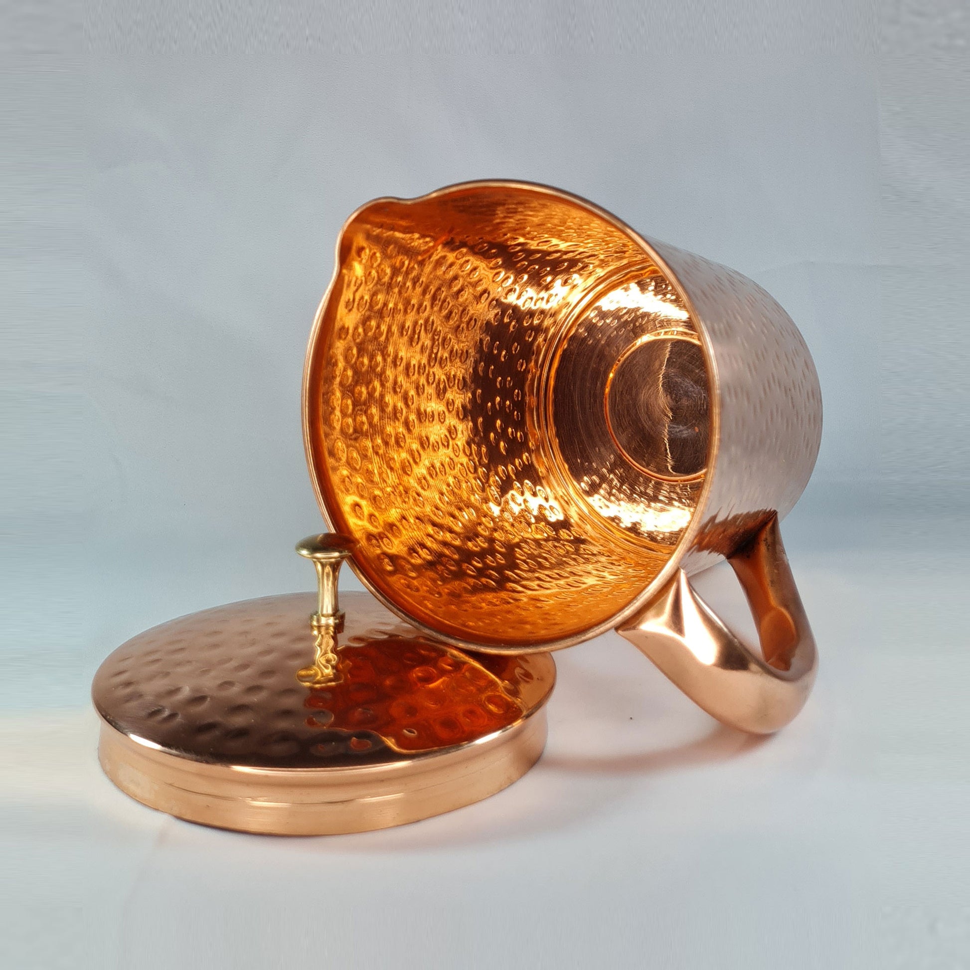 Authentic Premium Quality Pure Copper Jug 2.2L with easy grip handle showing inside of the jug