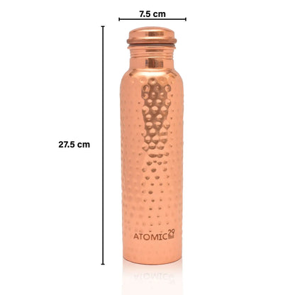 Hammered Copper water bottle with measurements on a white background