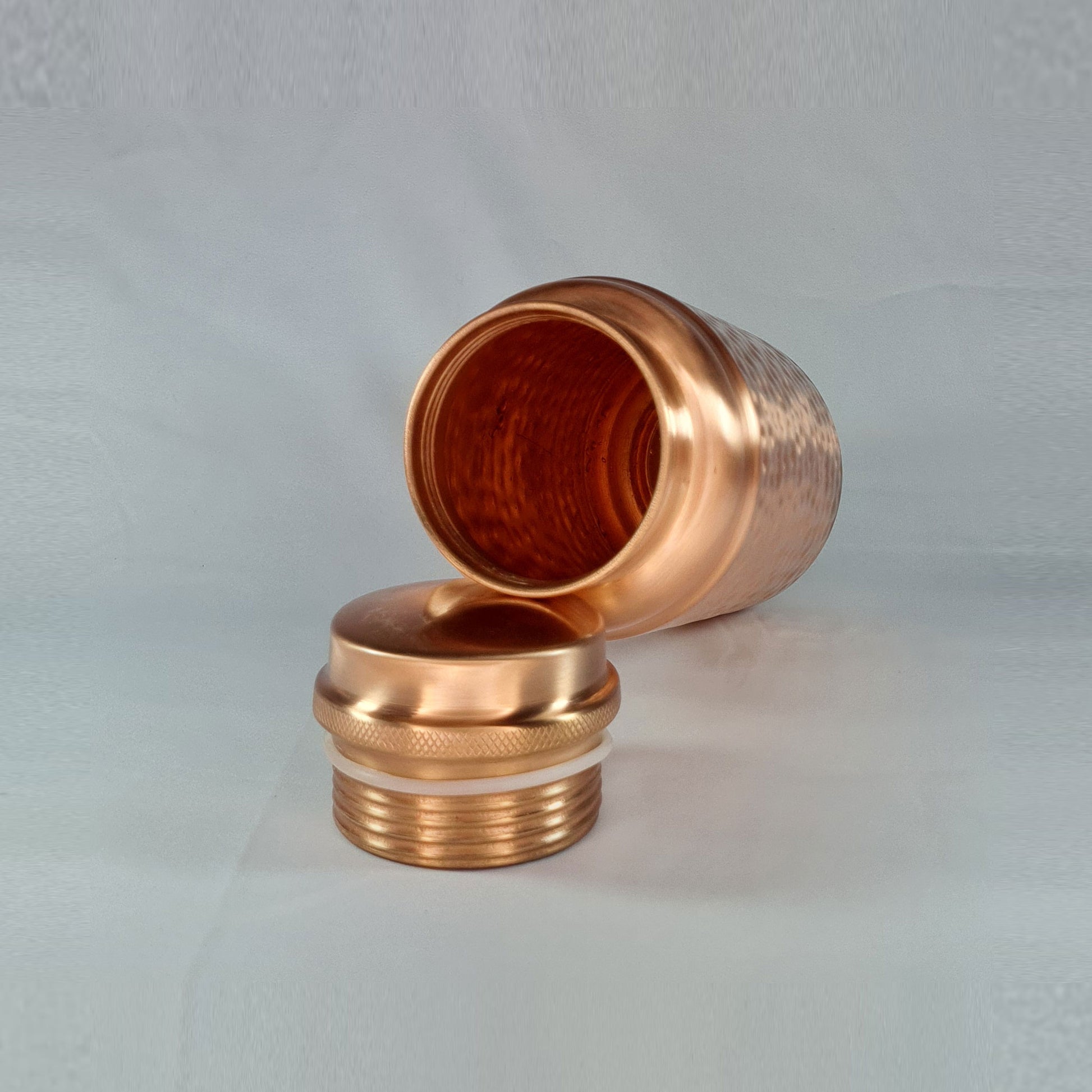Jumbo Copper Water Bottle Hammered Design 1.3L laid down showing inside of the bottle by Atomic29