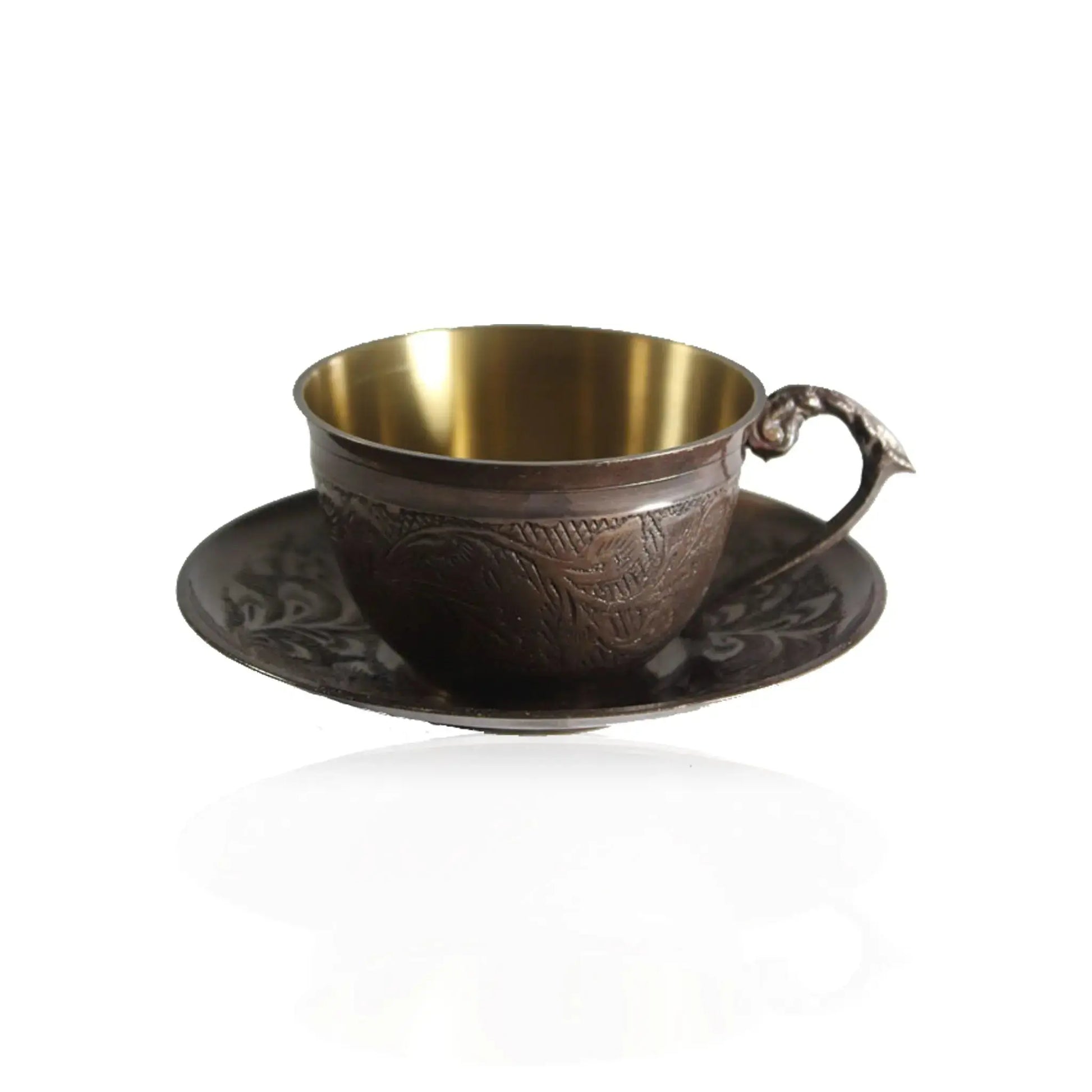 Bronze cup with brass interior on a matching saucer against a white background