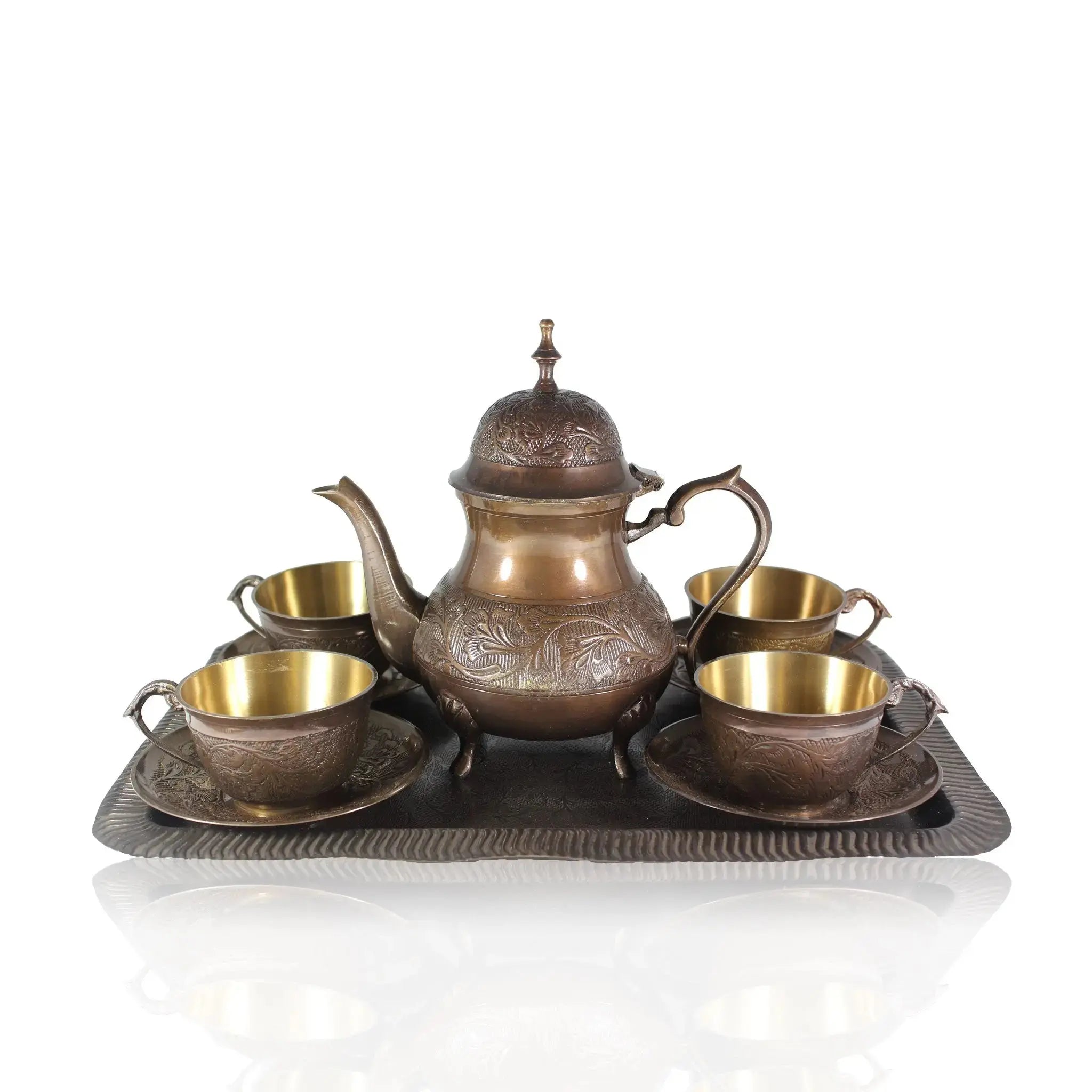 Bronze tea set with teapot, cups, and tray on a white background
