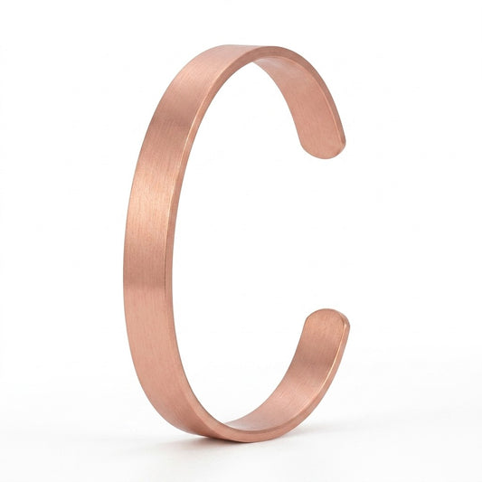 A minimalist copper cuff bracelet in smooth polish, shown on a clean white background.