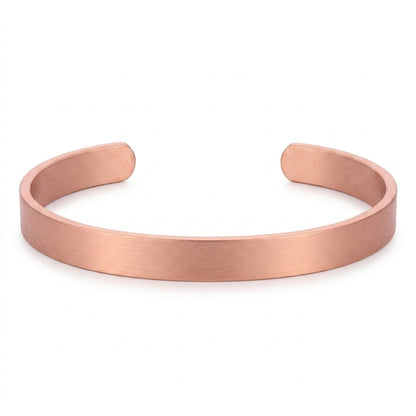 A minimalist open copper cuff bracelet in smooth polish, shown on a clean white background.