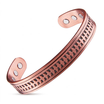 copper magnetic  bracelet with embossed arrow patterned design on a white background