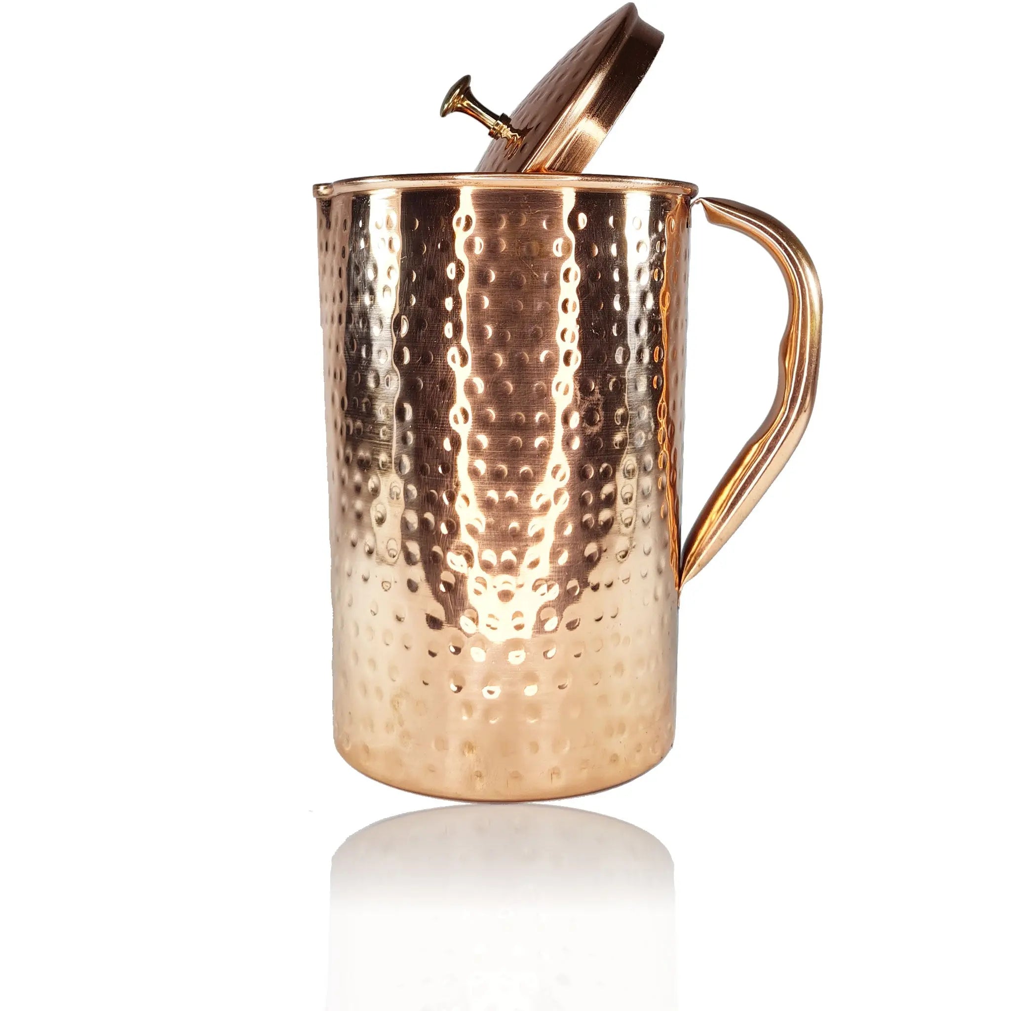 Copper pitcher with a lid on a white background