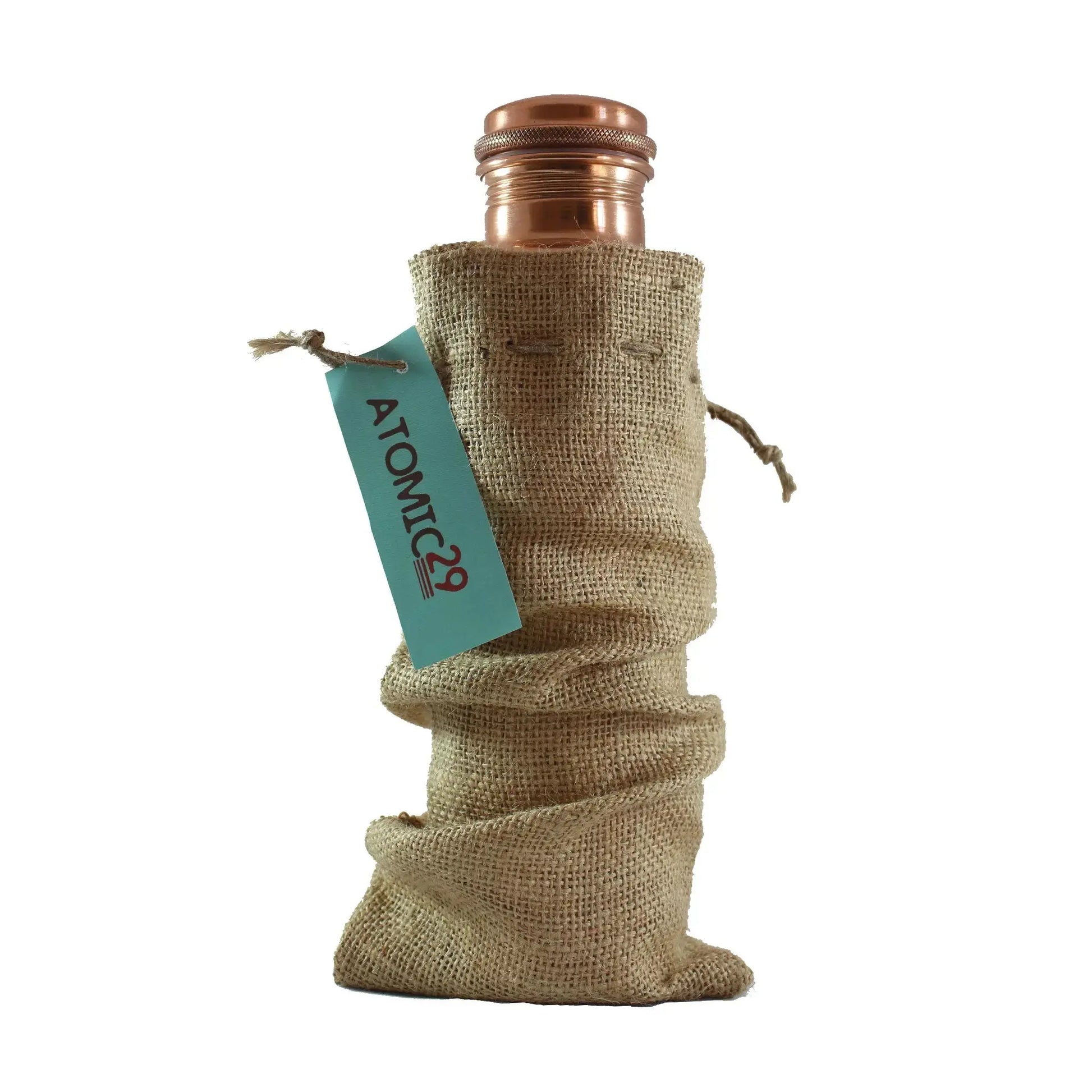 Bottle wrapped in burlap with a visible 'Atomic29' tag on a white background