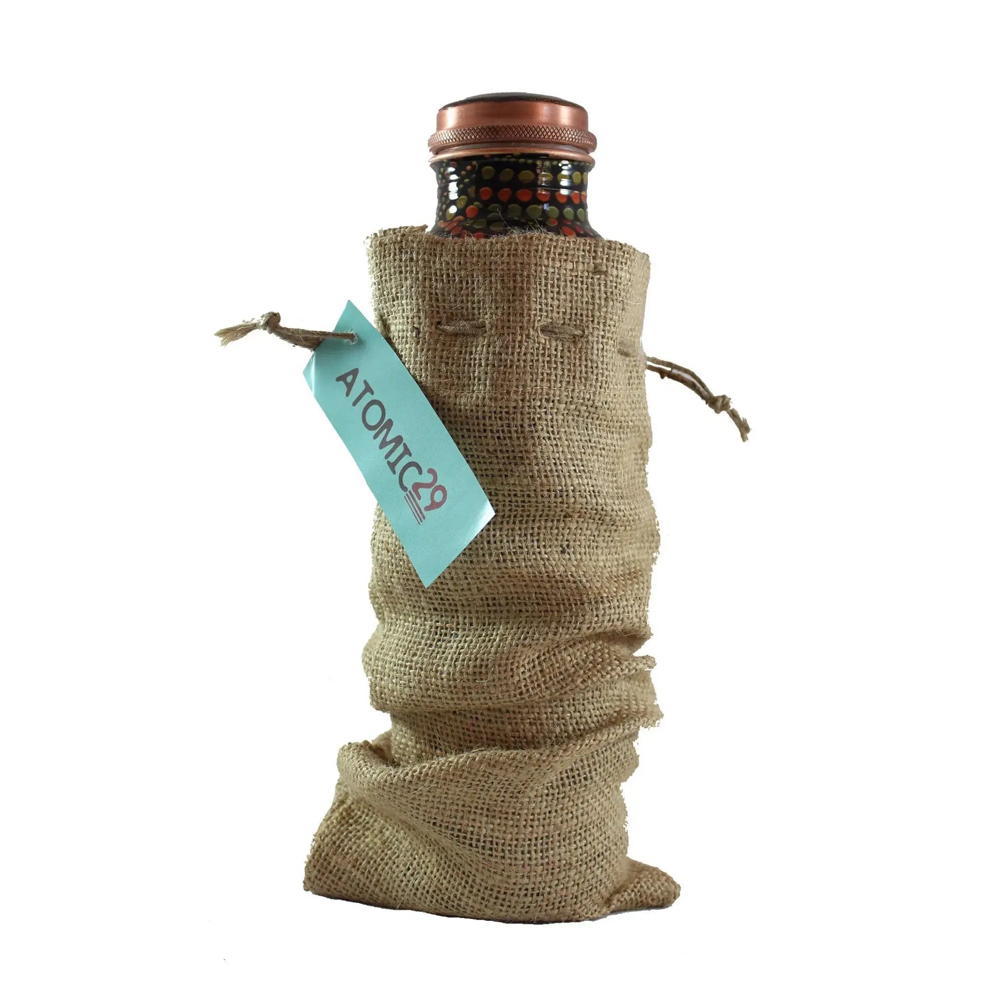 Bottle wrapped in burlap with a visible brand tag on a white background