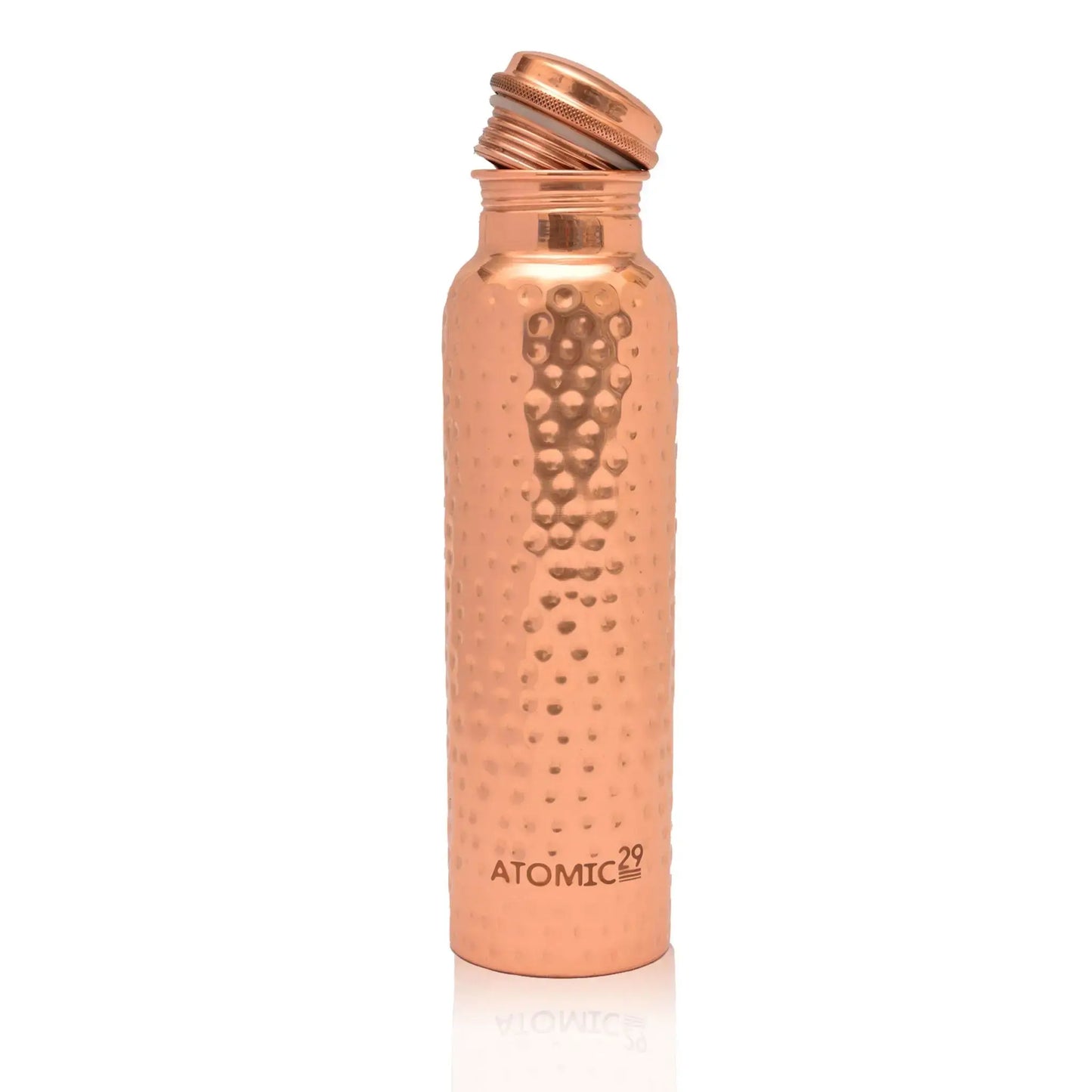 copper water bottle with hammered design on a white background