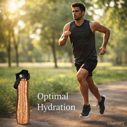 man running in park promoting atomic29 copper water bottle