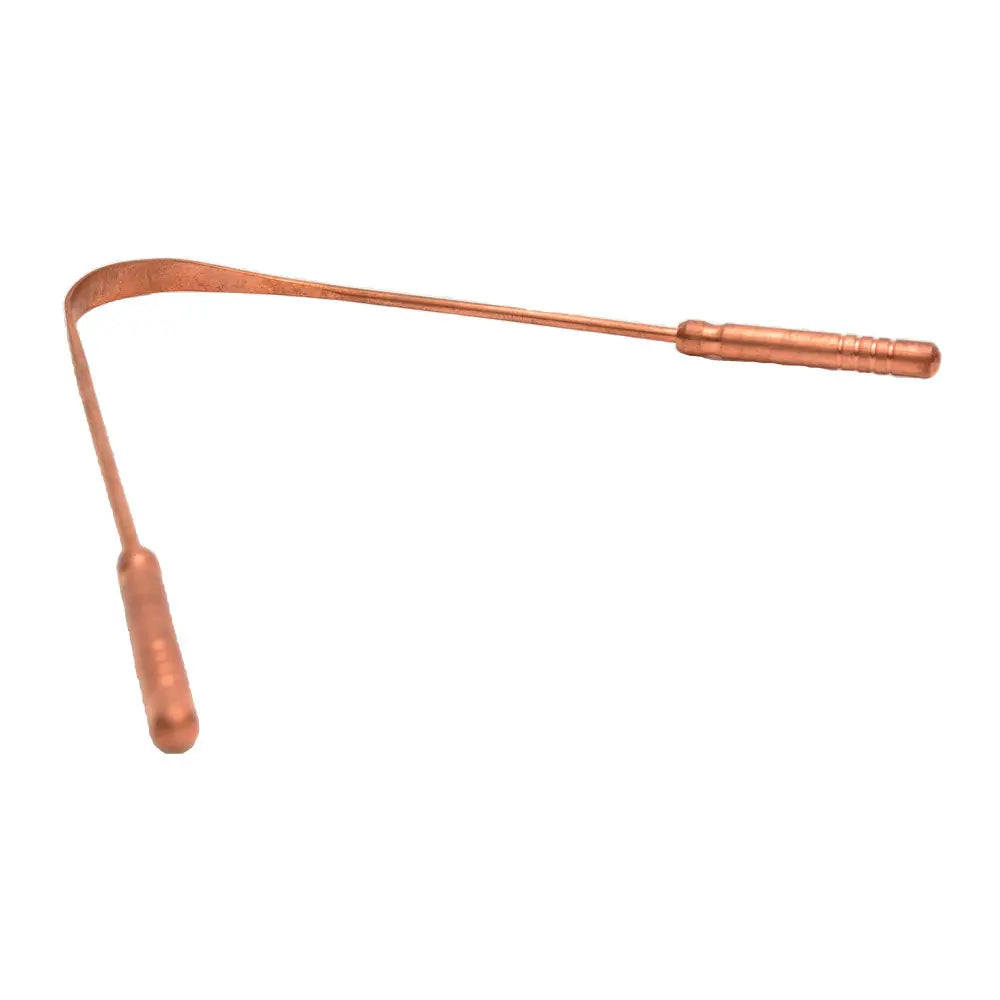 atomic29 copper tongue cleaner lying on flat 