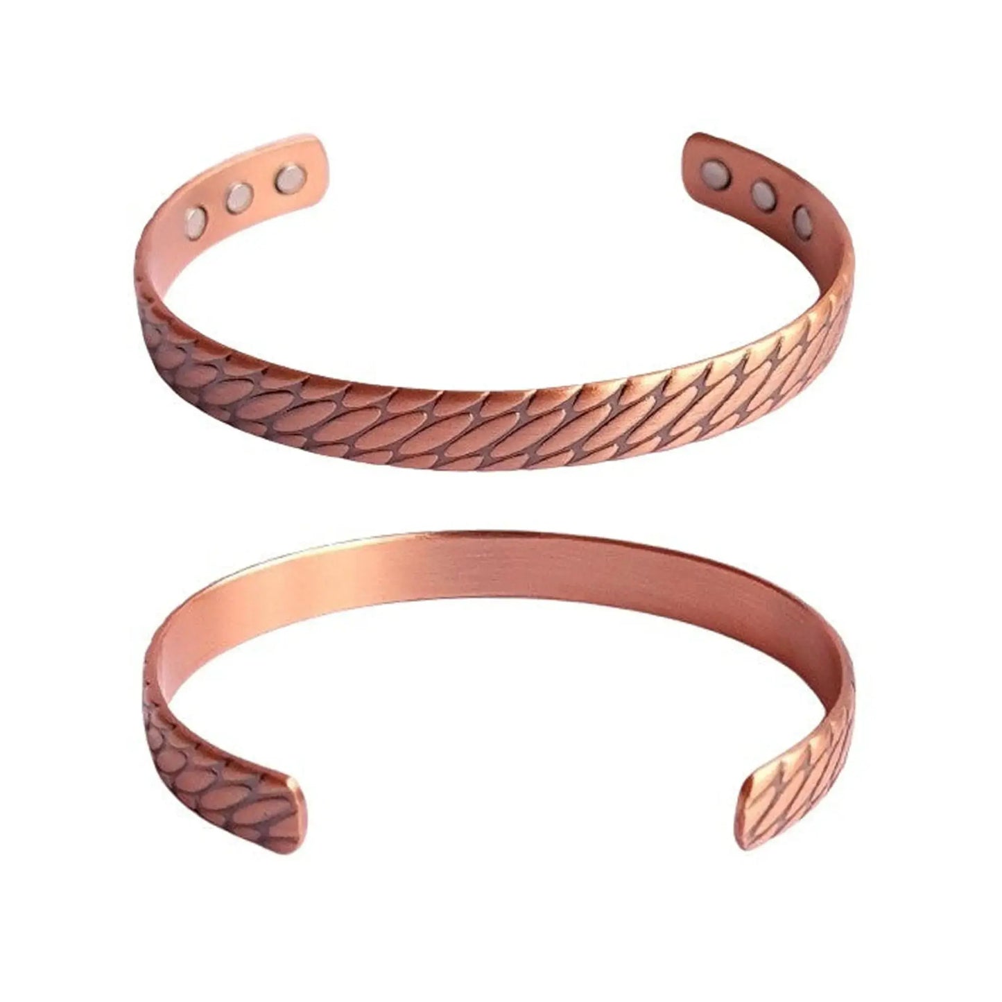 Two copper bracelets with embossed design on a white background